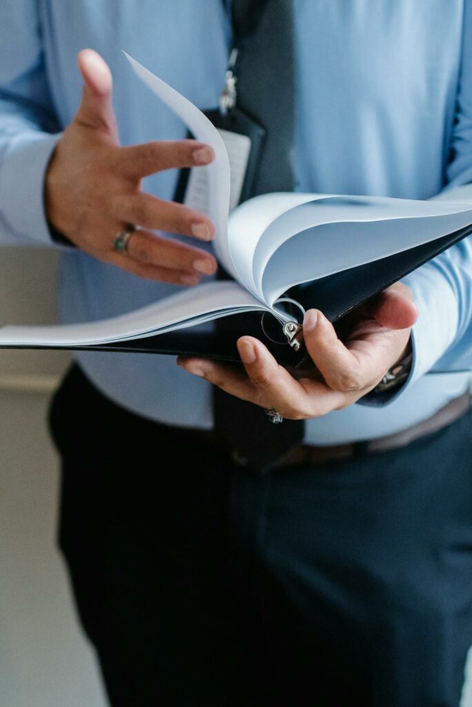 Businessman reading documents in office