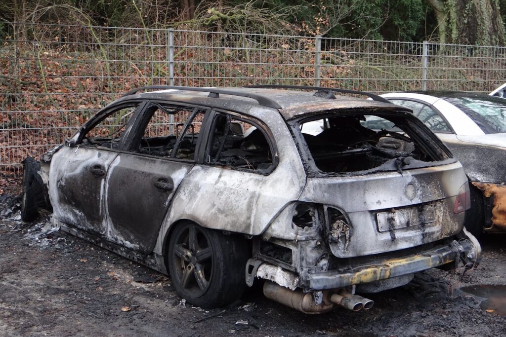 A Broken Car Parked Outside